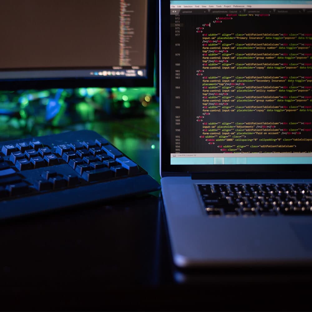 A monitor with coding on screen